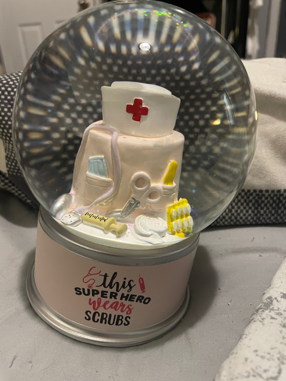 Nurse-Themed Snow Globe with Medical Décor